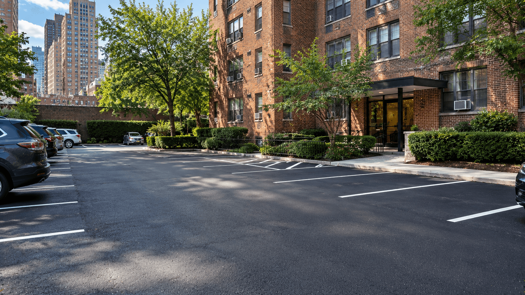 Freshly paved parking area at a New York City co-op residential building